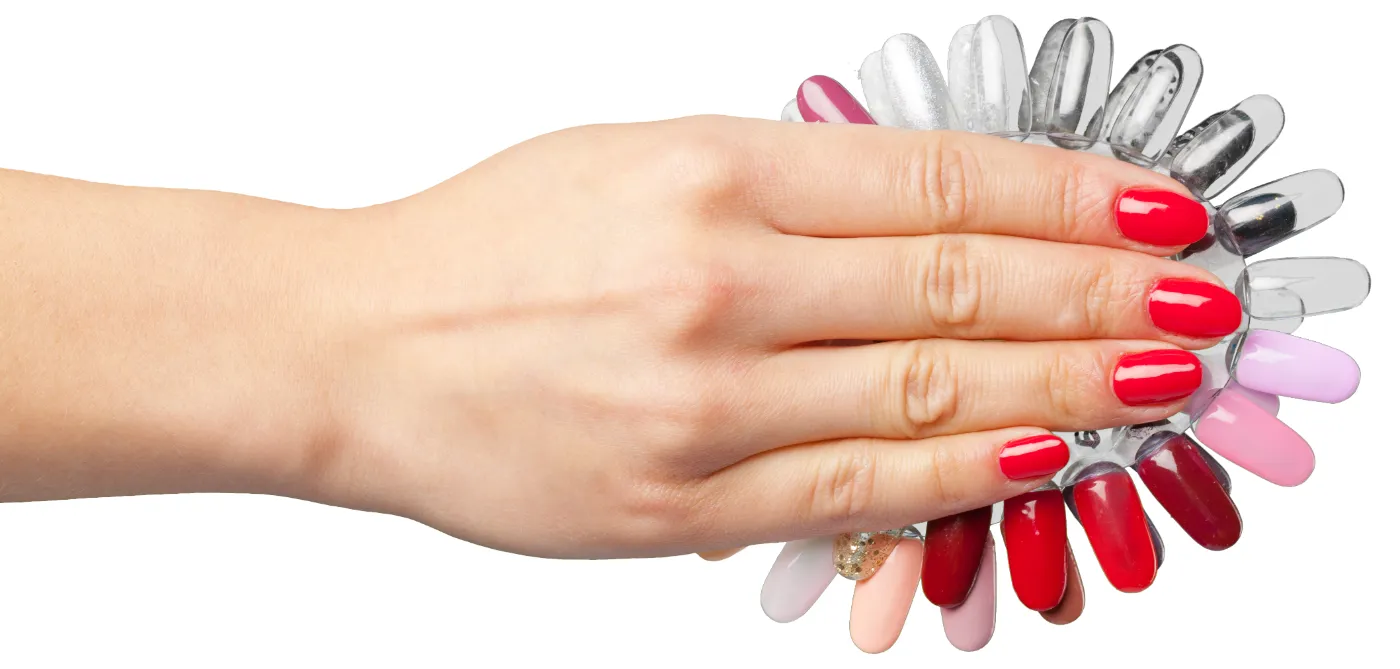 Hand with red gel nails and polish colour samples