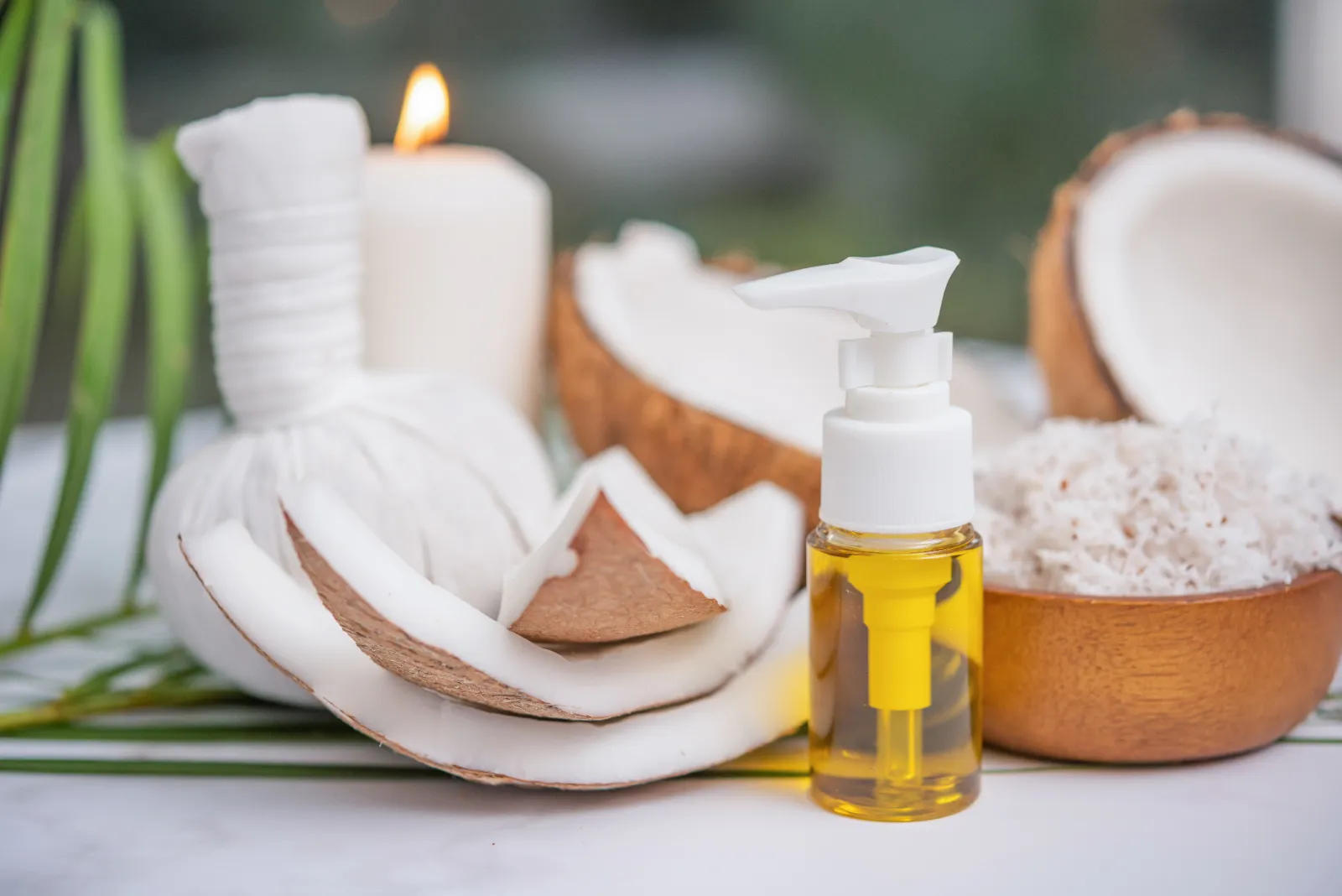 Coconut massage oil with tropical leaves at Rika Spa, Uluwatu Bali